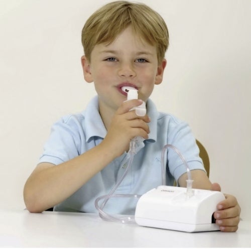 Omron CompAir C801 Compressor Nebuliser young using nebuliser with mouthpiece